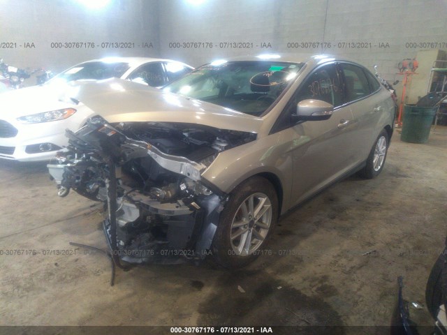 Photo 1 VIN: 1FADP3F24GL218786 - FORD FOCUS 