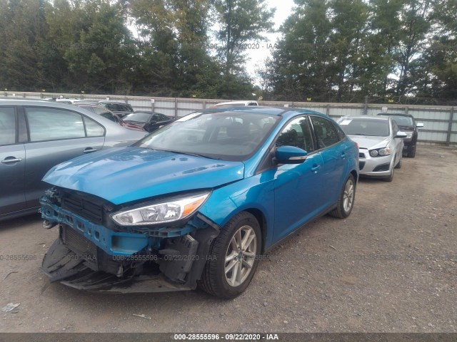 Photo 1 VIN: 1FADP3F24GL229478 - FORD FOCUS 