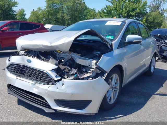 Photo 1 VIN: 1FADP3F24GL232395 - FORD FOCUS 