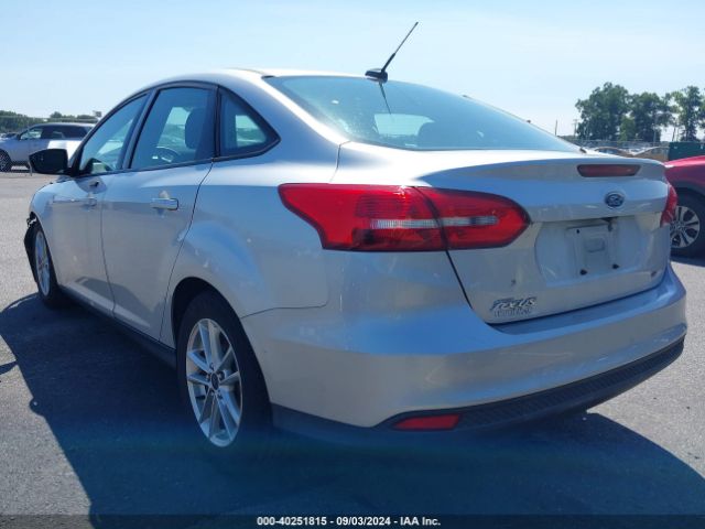 Photo 2 VIN: 1FADP3F24GL232395 - FORD FOCUS 