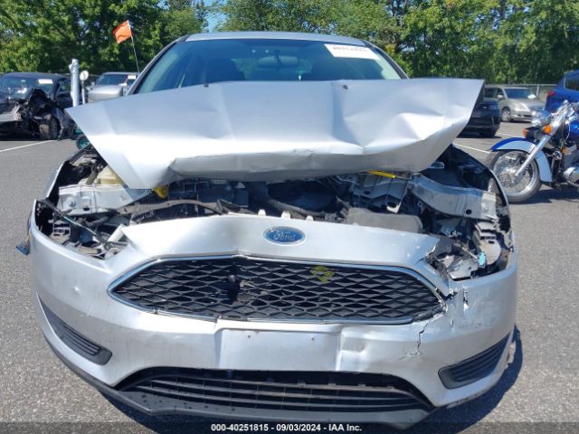 Photo 5 VIN: 1FADP3F24GL232395 - FORD FOCUS 