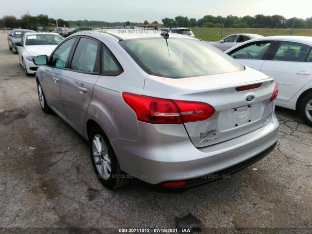 Photo 2 VIN: 1FADP3F24GL237726 - FORD FOCUS 