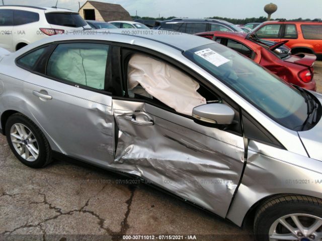 Photo 5 VIN: 1FADP3F24GL237726 - FORD FOCUS 