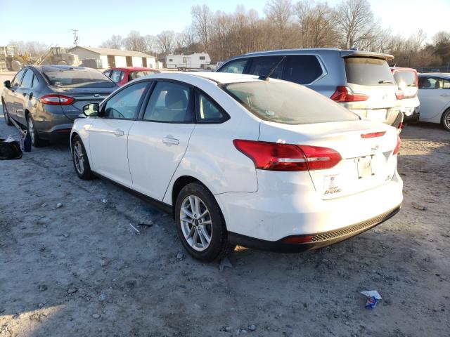 Photo 2 VIN: 1FADP3F24GL257586 - FORD FOCUS SE 