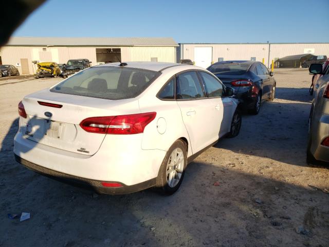 Photo 3 VIN: 1FADP3F24GL257586 - FORD FOCUS SE 