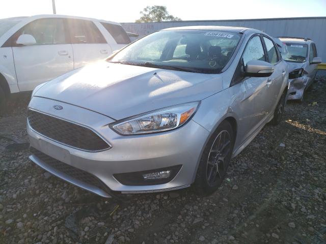 Photo 1 VIN: 1FADP3F24GL260097 - FORD FOCUS SE 