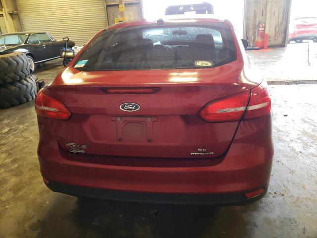 Photo 5 VIN: 1FADP3F24GL261265 - FORD FOCUS SE 