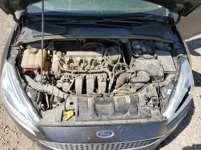 Photo 10 VIN: 1FADP3F24GL262884 - FORD FOCUS SE 