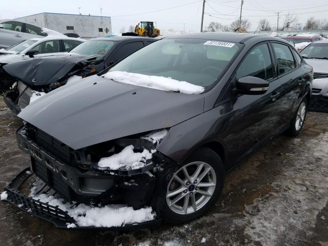 Photo 1 VIN: 1FADP3F24GL266675 - FORD FOCUS SE 