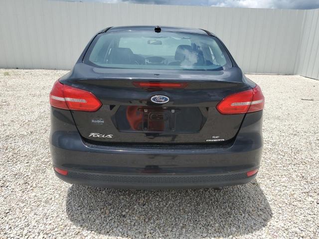 Photo 5 VIN: 1FADP3F24GL268538 - FORD FOCUS SE 