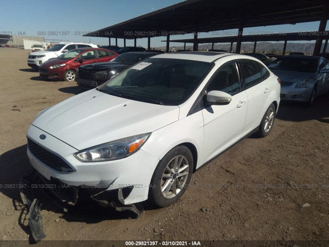 Photo 1 VIN: 1FADP3F24GL272332 - FORD FOCUS 