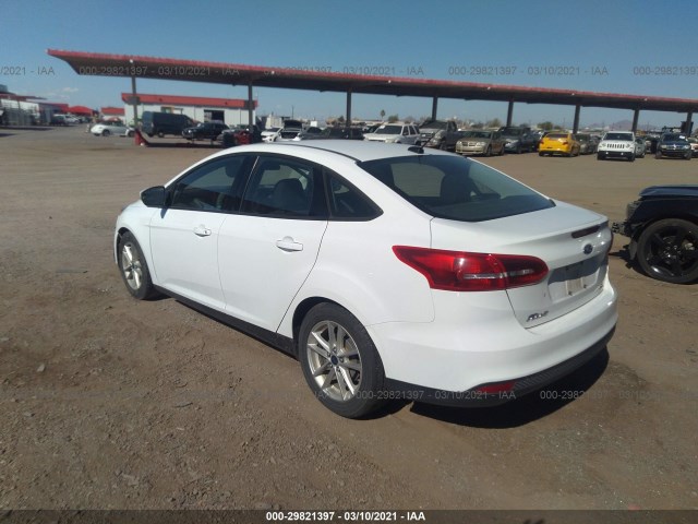 Photo 2 VIN: 1FADP3F24GL272332 - FORD FOCUS 