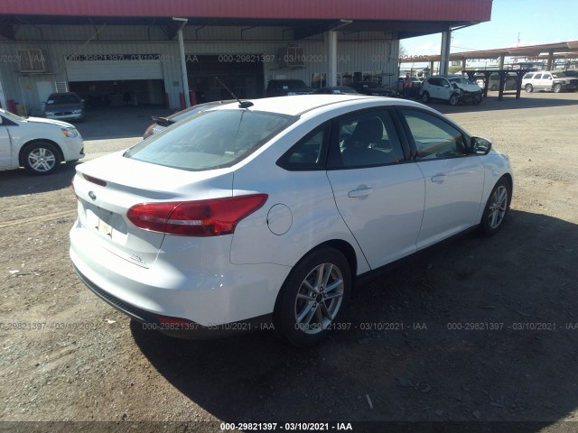 Photo 3 VIN: 1FADP3F24GL272332 - FORD FOCUS 