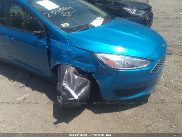 Photo 5 VIN: 1FADP3F24GL274274 - FORD FOCUS 