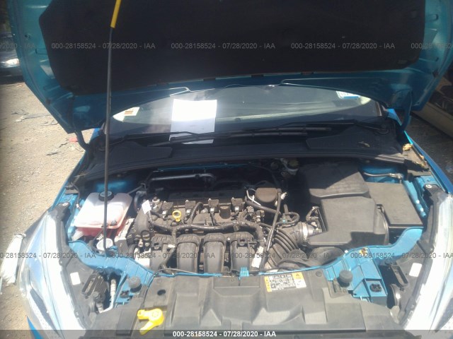 Photo 9 VIN: 1FADP3F24GL274274 - FORD FOCUS 