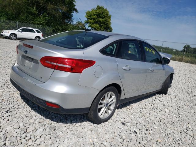 Photo 3 VIN: 1FADP3F24GL277370 - FORD FOCUS SE 