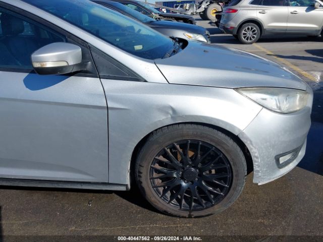 Photo 5 VIN: 1FADP3F24GL290720 - FORD FOCUS 