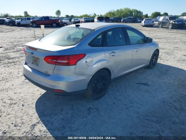 Photo 3 VIN: 1FADP3F24GL291494 - FORD FOCUS 