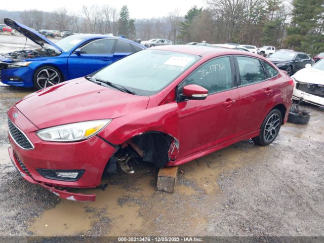 Photo 1 VIN: 1FADP3F24GL293035 - FORD FOCUS 