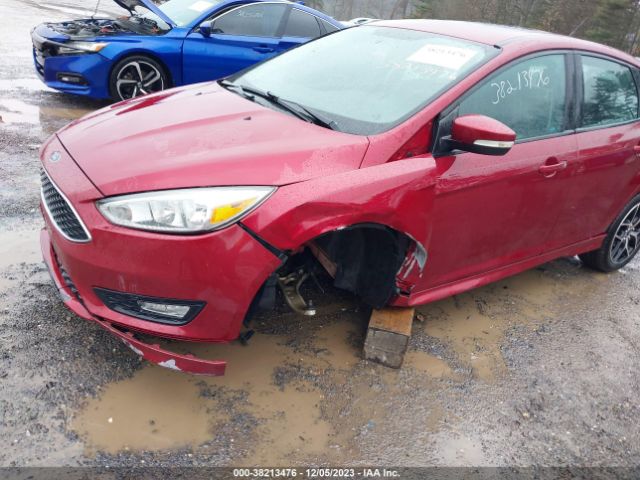 Photo 5 VIN: 1FADP3F24GL293035 - FORD FOCUS 