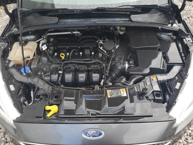 Photo 10 VIN: 1FADP3F24GL297084 - FORD FOCUS 