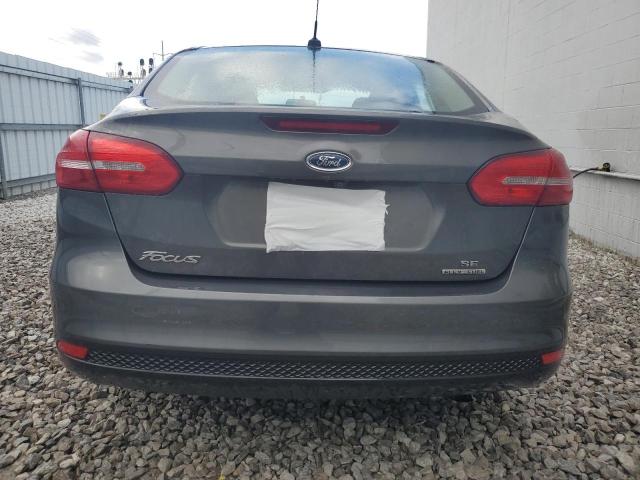 Photo 5 VIN: 1FADP3F24GL297084 - FORD FOCUS 