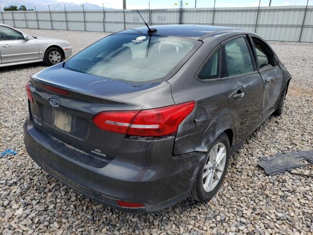 Photo 3 VIN: 1FADP3F24GL297425 - FORD FOCUS SE 