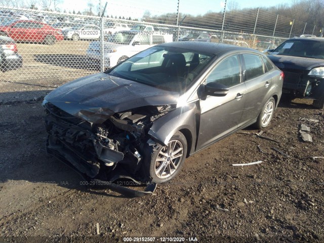 Photo 1 VIN: 1FADP3F24GL303028 - FORD FOCUS 