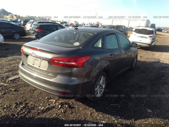 Photo 3 VIN: 1FADP3F24GL303028 - FORD FOCUS 