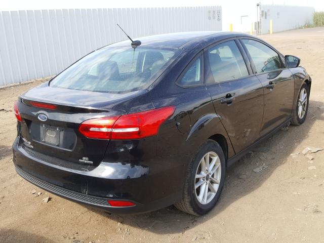 Photo 3 VIN: 1FADP3F24GL305149 - FORD FOCUS SE 