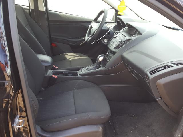 Photo 4 VIN: 1FADP3F24GL305149 - FORD FOCUS SE 