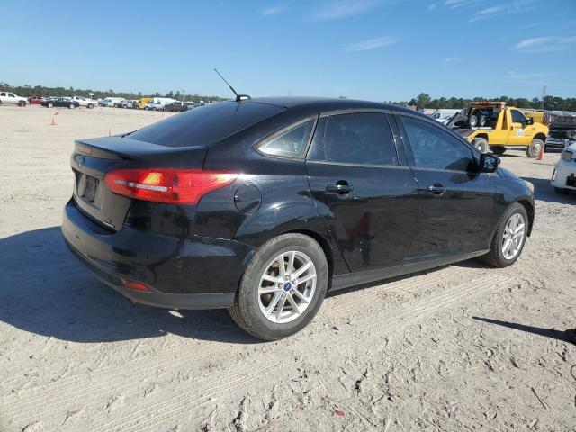 Photo 2 VIN: 1FADP3F24GL309976 - FORD FOCUS SE 