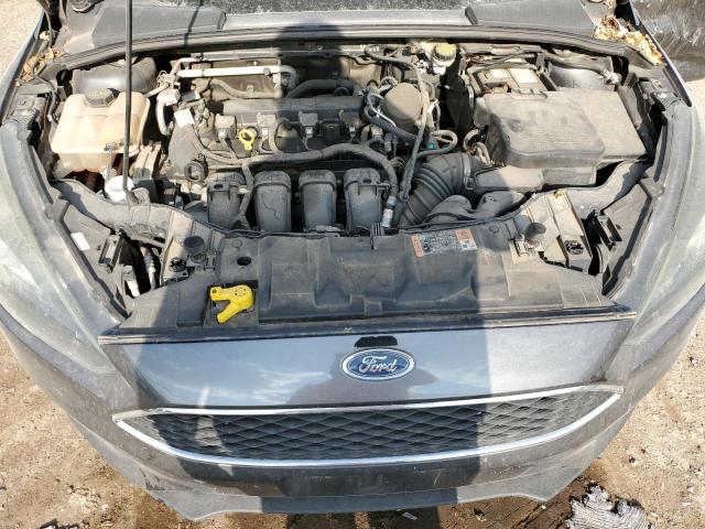 Photo 10 VIN: 1FADP3F24GL311825 - FORD FOCUS 