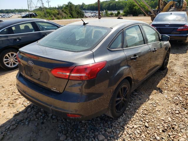 Photo 3 VIN: 1FADP3F24GL320279 - FORD FOCUS SE 