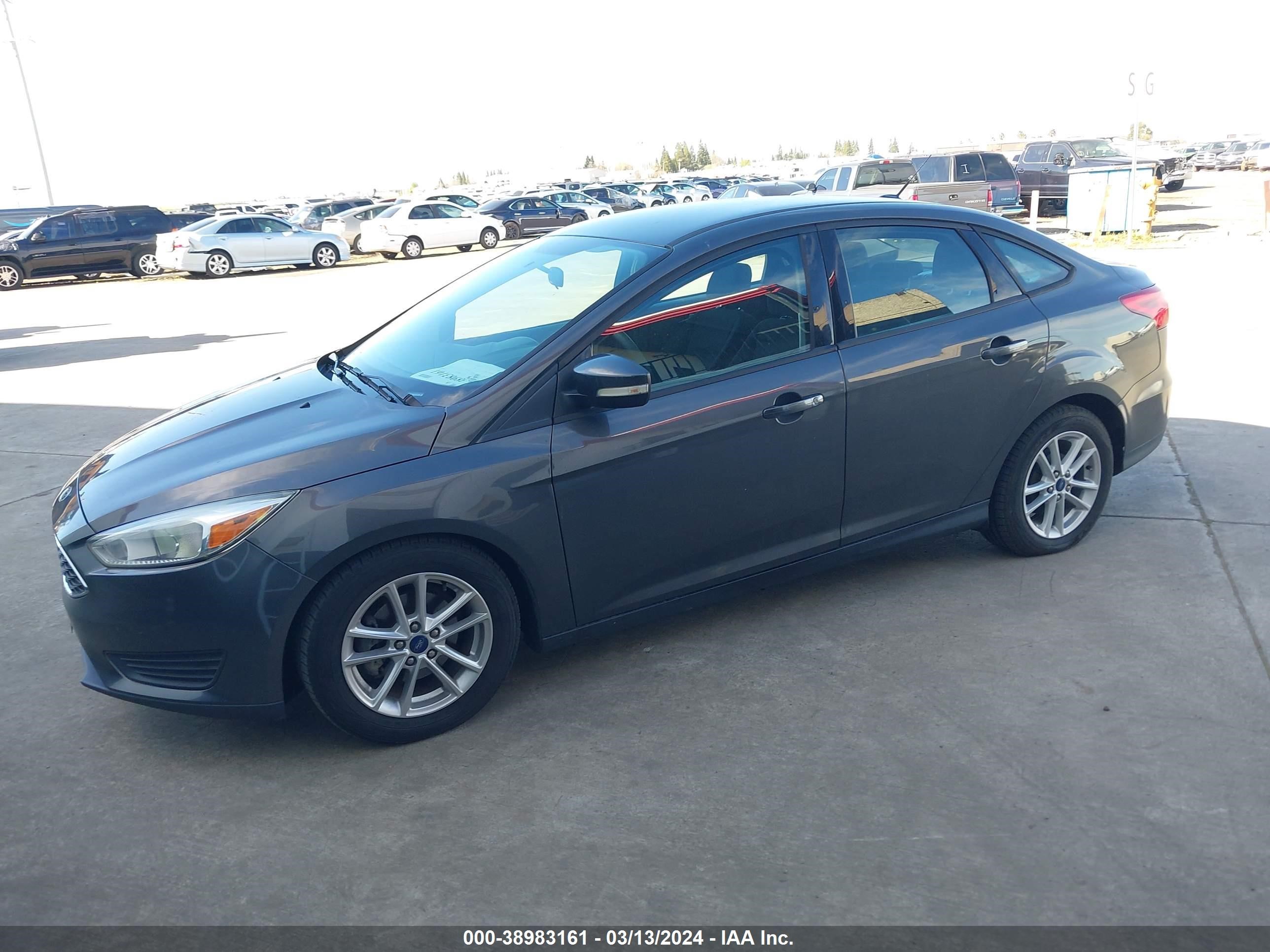 Photo 1 VIN: 1FADP3F24GL322159 - FORD FOCUS 