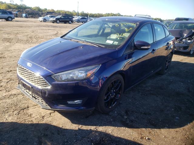 Photo 1 VIN: 1FADP3F24GL325871 - FORD FOCUS SE 