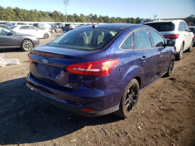 Photo 3 VIN: 1FADP3F24GL325871 - FORD FOCUS SE 