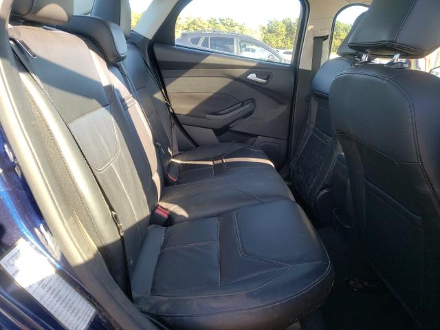 Photo 5 VIN: 1FADP3F24GL325871 - FORD FOCUS SE 