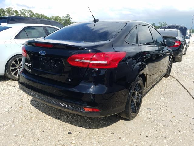 Photo 3 VIN: 1FADP3F24GL326132 - FORD FOCUS 