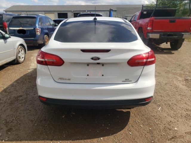 Photo 5 VIN: 1FADP3F24GL336353 - FORD FOCUS SE 