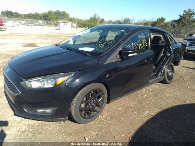 Photo 1 VIN: 1FADP3F24GL340130 - FORD FOCUS 