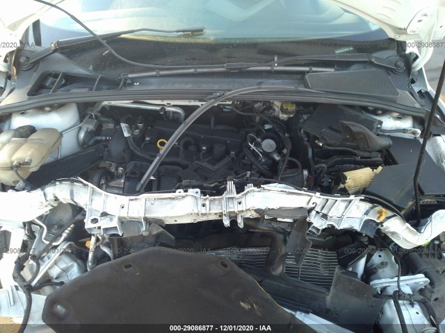 Photo 9 VIN: 1FADP3F24GL340726 - FORD FOCUS 