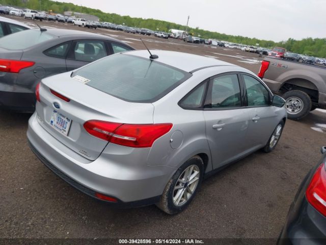 Photo 3 VIN: 1FADP3F24GL341052 - FORD FOCUS 