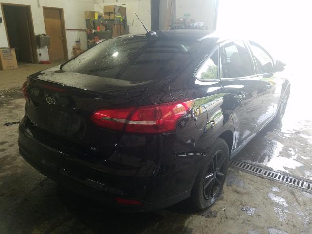 Photo 3 VIN: 1FADP3F24GL344551 - FORD FOCUS SE 