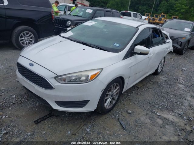 Photo 1 VIN: 1FADP3F24GL350088 - FORD FOCUS 