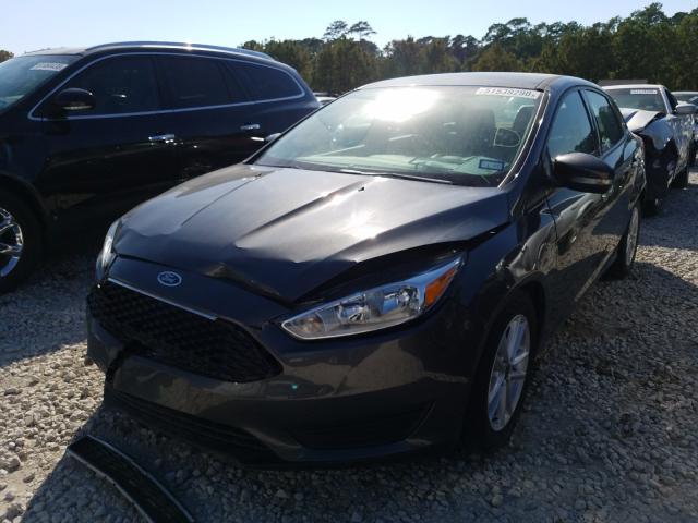 Photo 1 VIN: 1FADP3F24GL359907 - FORD FOCUS 