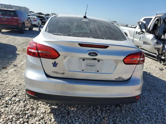 Photo 5 VIN: 1FADP3F24GL359910 - FORD FOCUS SE 