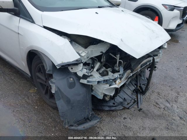 Photo 5 VIN: 1FADP3F24GL365853 - FORD FOCUS 