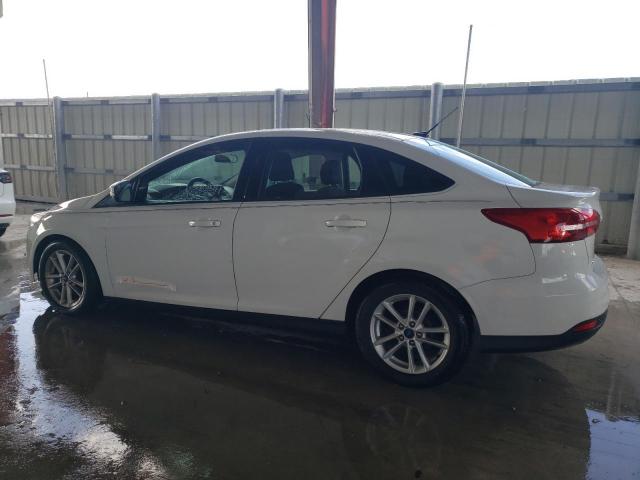 Photo 1 VIN: 1FADP3F24GL376917 - FORD FOCUS SE 