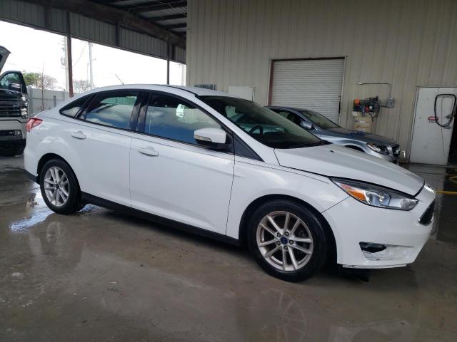 Photo 3 VIN: 1FADP3F24GL376917 - FORD FOCUS SE 